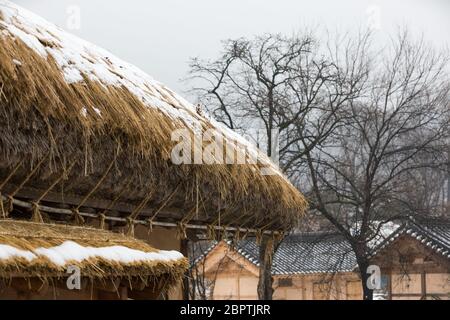 Winter in Korea, snowy traditional village landscape, Oeam folk village. Stock Photo