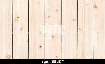 panoramic wooden background - unpainted wood board from vertical narrow pine planks Stock Photo