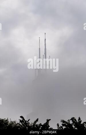 Image of the top   of Chicago's historic Willis Tower, formerly The Sears Tower. On a cloudy day where the building mostly is shrouded in clouds, with Stock Photo