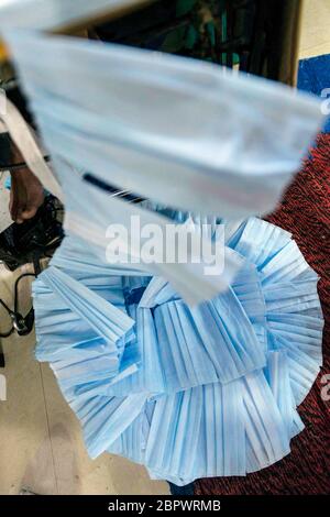 A pile of mask at the manufacturing site at the CRPF Northern Sector staff camp in New Delhi, India, on Wednesday, April 15, 2020. India will allow makers of information technology hardware, farmers and industries in rural areas to resume operations after April 20 as Prime Minister Narendra Modi crafts a plan to exit the world's biggest lockdown, that's been extended to May 3, and revive stalled economic activity. Photographer: Kuldeep Singh Rohilla Stock Photo