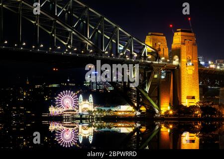 Sydney Harbour Bridge and Luna Park at night. Stock Photo