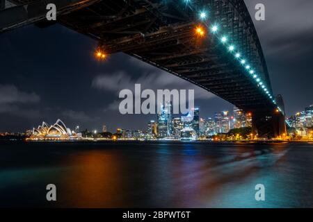 Nightly view on the famous Harbour Bridge and Opera House. Stock Photo