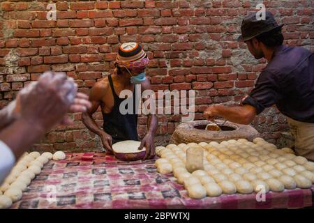 New Delhi / India - February 19, 2020: man selling street ...