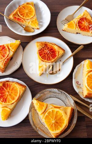 Fruity sponge cake with fresh candied oranges Stock Photo