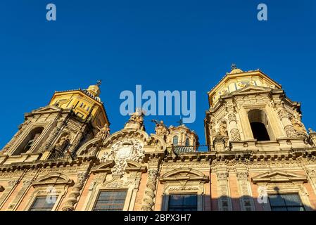 Golden early morning light falling on the facade of the church of San Luis de los Franceses in Seville, Spain Stock Photo