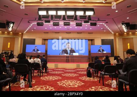 (200520) -- BEIJING, May 20, 2020 (Xinhua) -- Journalists attend a press conference of the third session of the 13th National Committee of the Chinese People's Political Consultative Conference (CPPCC) through video link in Beijing, capital of China, May 20, 2020. The CPPCC National Committee held a press conference on Wednesday afternoon, ahead of the top political advisory body's annual session. Guo Weimin, spokesperson for the third session of the 13th National Committee of the CPPCC, briefed media on the session and took questions through video link due to epidemic response. (Xinhua/Lyu S Stock Photo