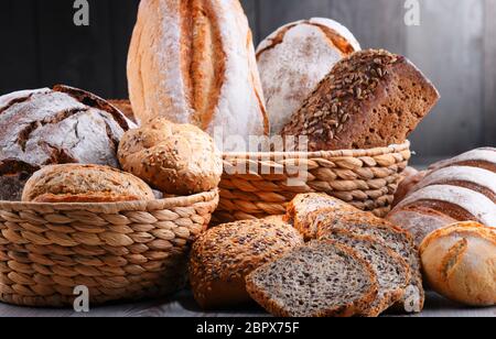 Composition with assorted bakery products in wicker basket Stock Photo