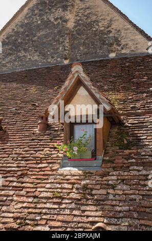 Old tiled roof of house in pilgrimage town of Rocamadour, Episcopal city and sanctuary of the Blessed Virgin Mary, Lot, Midi-Pyrenees, France Stock Photo