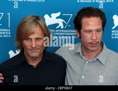 VENICE, ITALY - AUGUST 31: Viggo Mortensen and Reda Kateb attends the 'Loin Des Hommes' photocall during the 71st Venice Film Festival Stock Photo