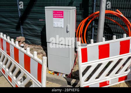 Datteln, Ruhrgebiet, Nordrhein-Westfalen, Germany - Telekom distribution box for fast internet, construction site DSL cable connection for households. Stock Photo