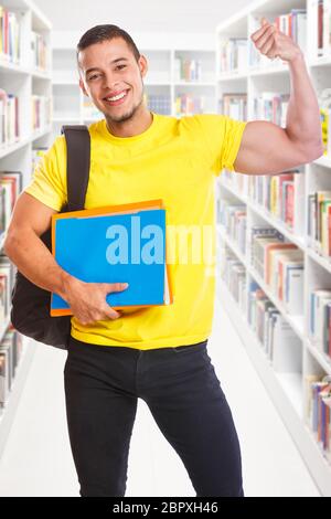 Student young man success successful portrait format strong power library education people learning Stock Photo