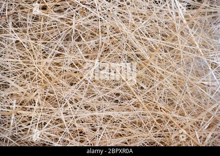 Natural texture of straw. Craft packaging. Coconut coir Stock Photo