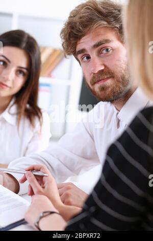 Teamwork discusses problems in the workplace Stock Photo