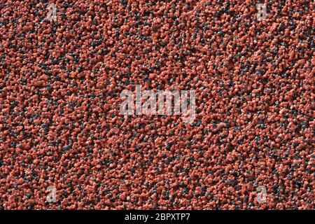 close view of the wall surface, decorative finishing, heat insulation granules or granite particles Stock Photo