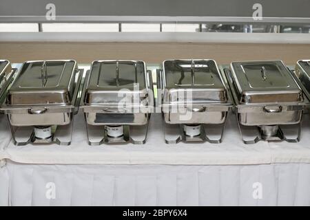 Food Warmers Trays Ready at Buffet Table Stock Photo