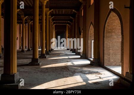 View of wooden architecture and pattern of pillars inside the famous Jama Masjid in the town of Srinagar in Kashmir Stock Photo