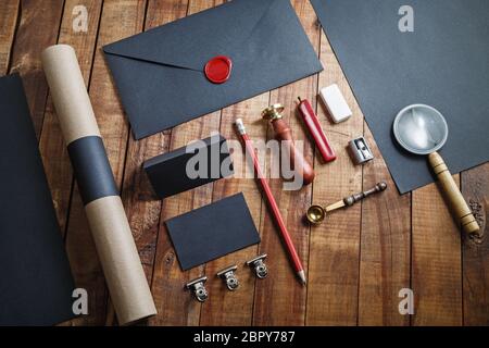 Blank vintage stationery on wood table background. Responsive design template. Mockup for branding identity. Stock Photo