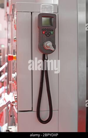 Wired Machine Remote Control With Display in Factory Stock Photo