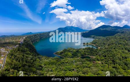 Panoramic aerial view of beautiful twin lakes in an ancient volcanic caldera (Lakes Buyan and Tamblingan, Bali, Indonesia) Stock Photo