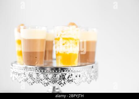 Delicious french caramel and chocolate dessert. The concept of food, desserts and pastries, catering and restaurant. Stock Photo
