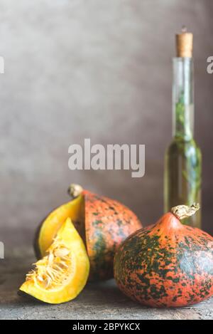 Two hokkaido pumpkins on the wooden background Stock Photo - Alamy