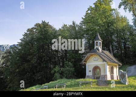 Sunlight morning view of tourist attraction small chapel in Bavarian national park Berchtesgaden Stock Photo