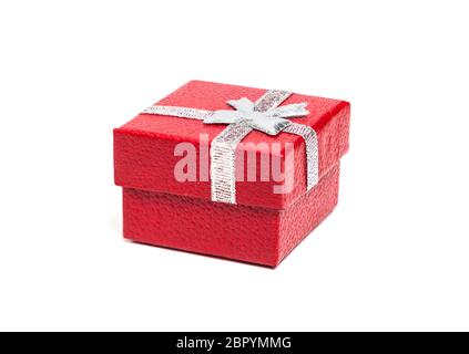 Red gift box with silver ribbon isolated on white background Stock Photo