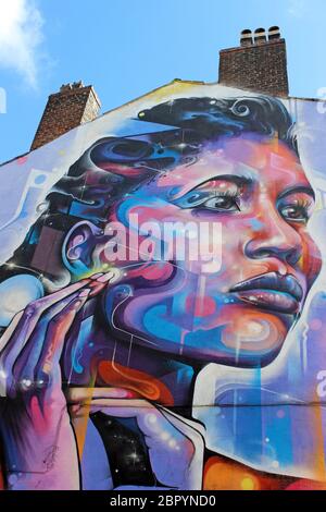 Street Art Psychedelic Strong woman by Mr Cenz Stock Photo