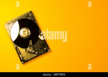 Colorful hdd. open hard disk drive. The concept of data storage. data array. hard drive from the computer. hdd with mirror effect. copy space Stock Photo