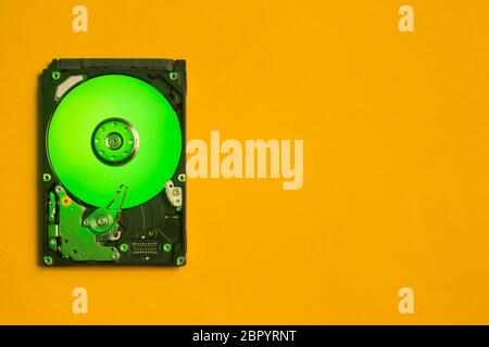 Colorful hdd. open hard disk drive. The concept of data storage. data array. hard drive from the computer. hdd with mirror effect. copy space Stock Photo