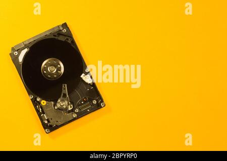 Colorful hdd. open hard disk drive. The concept of data storage. data array. hard drive from the computer. hdd with mirror effect. copy space Stock Photo