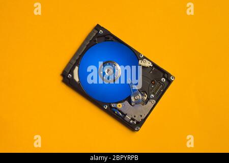 Colorful hdd. open hard disk drive. The concept of data storage. data array. hard drive from the computer. hdd with mirror effect. copy space Stock Photo