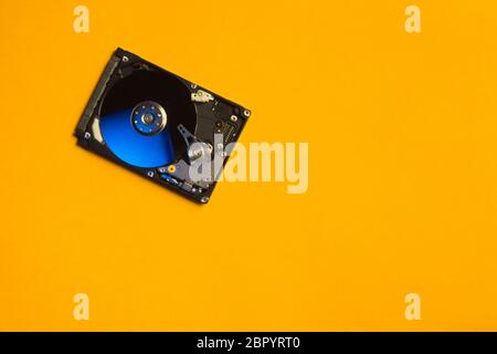 Colorful hdd. open hard disk drive. The concept of data storage. data array. hard drive from the computer. hdd with mirror effect. copy space Stock Photo