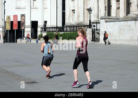 London, UK. 20th May, 2020. A deserted Trafalgar Square. Wednesday sun in deserted West End. Credit: JOHNNY ARMSTEAD/Alamy Live News Stock Photo
