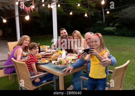 Happy Caucasian family taking a selfie Stock Photo