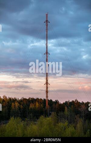 Tall communication tower in urban environment in Espoo, Finland, with no people in scene Stock Photo