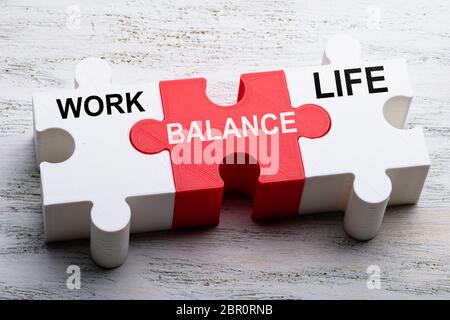 Balance And Life Words Written On Pieces Of Jigsaw Puzzle Stock Photo