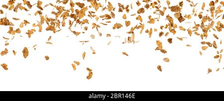 Falling corn flakes isolated on white background Stock Photo