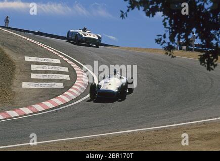 Fangio in a Mercedes W196 and Stirling Moss in the 300SLR at the Monterey Historic Auto races at Laguna Seca race track 1986 Stock Photo