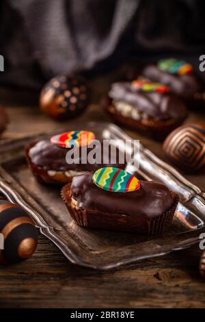 Mini chocolate cakes with Easter decoration Stock Photo