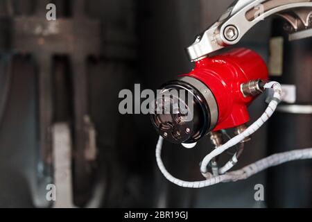 Red infrared flame Sensor on an industrial site. Protection of production and gas turbine engines from fire. Stock Photo