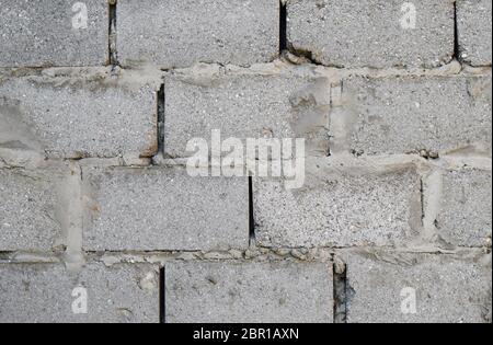 Background from slag stones. The wall put from slag stone. Stock Photo