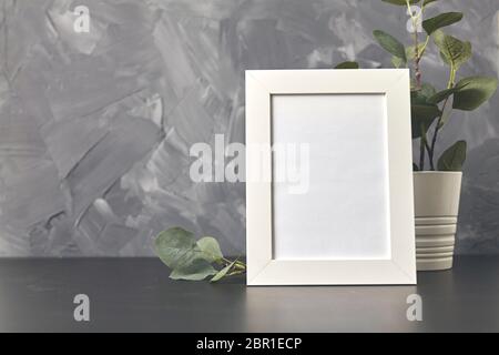 Photo frame on wood table. On gray background with copy space Stock Photo