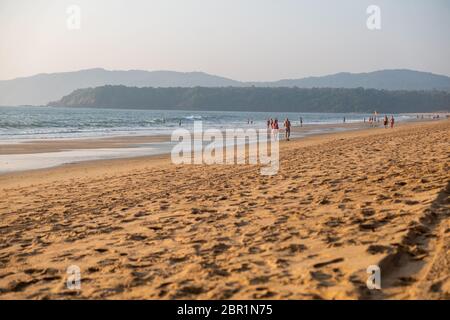 A wide angle view of Agonda Beach in Goa at sunset, India. Stock Photo