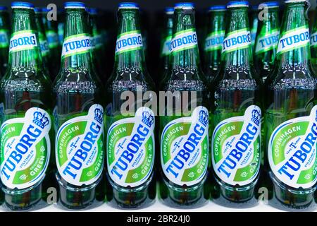 Tyumen, Russia-may 17, 2020: Bottles of Tuborg beer in refrigerator of supermarket close up. Stock Photo