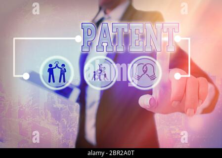 Conceptual hand writing showing Patent. Concept meaning government authority or licence conferring a right or title Stock Photo