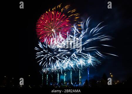 a colorful fireworks on the dark sky Stock Photo