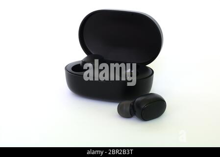black wireless headphone charging box Stock Photo