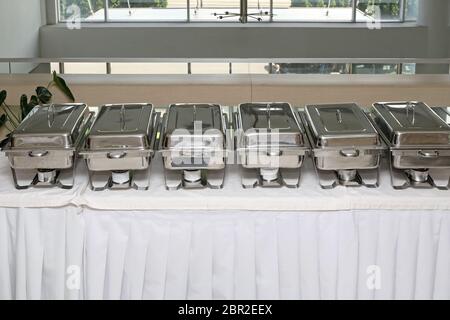 Food Warmers Trays Ready at Buffet Table Stock Photo