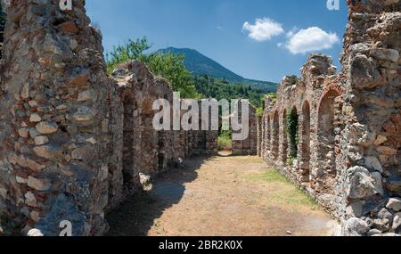 Ruins beside the Hagia Sophia church in the medieval, byzantine 'castletown' of Mystras, close to Sparta town, Lakonia, Peloponnese. Stock Photo